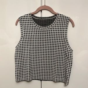 Theory size L sleeveless top hits above waist, very stretchy and comfy!